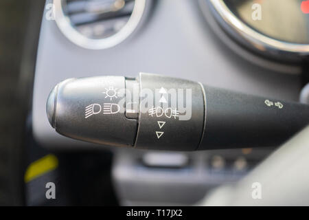 modern car interior with light switch close up. Stock Photo