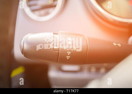 modern car interior with light switch close up. Stock Photo