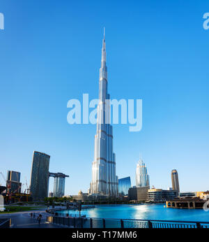 Dubai, United Arab Emirates - December 11, 2018: Burj Khalifa skyscraper view over the Dubai fountain from the Burj Park Stock Photo