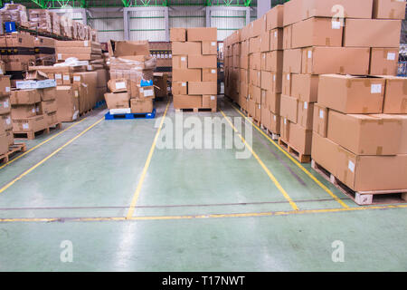 The Yellow Line breaks of empty space for keep material boxes or product boxes in warehouse area. Stock Photo
