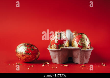 Red painted Easter eggs on red background Stock Photo