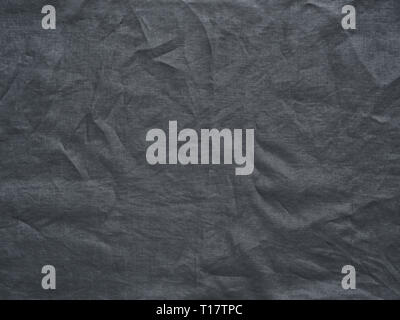 Gray linen texture as background. Gray linen crumpled tablecloth. Can use as mock up for design. Copy space for text Stock Photo