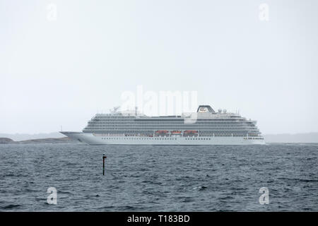 Bud, Norway. 24th March 2019. Cruise ship 'Viking Sky' arrives at safe waters 24 hours after loosing all engine power and drifting in a storm for several hours off the Norwegian coast. Tore Sætre / Alamy Stock Photo