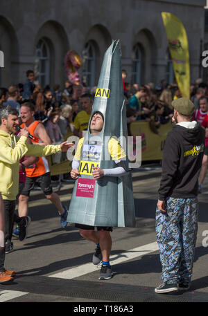 London, UK. 24 March, 2019. The second London Landmarks Half Marathon takes place, starting on Pall Mall and finishing in Whitehall after a route taking in the West End and City of London as far as Tower Hill, with a £6 million charity fundraising target. Charity runners, runners in great costumes, Guinness World Record Attempts and celebrities take part. Credit: Malcolm Park/Alamy Live News. Stock Photo