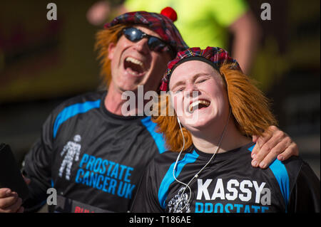 London, UK. 24 March, 2019. The second London Landmarks Half Marathon takes place, starting on Pall Mall and finishing in Whitehall after a route taking in the West End and City of London as far as Tower Hill, with a £6 million charity fundraising target. Charity runners, runners in great costumes, Guinness World Record Attempts and celebrities take part. Credit: Malcolm Park/Alamy Live News. Stock Photo