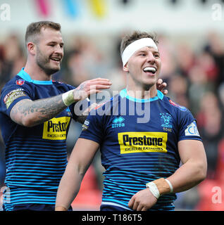 Salford, UK. 24th March 2019.  AJ Bell Stadium, Salford, England; Rugby League Betfred Super League, Salford Red Devils vs Wigan Warriors; Wigan Warriors Zak Hardaker and George Williams celebrates late try. Credit: Dean Williams/Alamy Live News Stock Photo