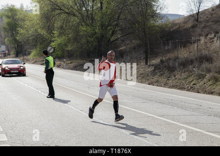 Madrid, Spain. 24th Mar 2019.  Runner of the marathon vias verdes on its way through Perales de Tajuña, in Madrid, Spain. Stock Photo