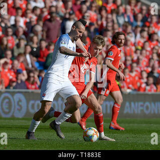 Cardiff, Wales, UK. 24th Mar 2019. Football, UEFA European Qualifiers Group E, Wales v Slovakia, 24/03/19, Cardiff City Stadium, K.O 2PM  Wales' David Brooks challenges Slovakia's Marek Hamsik  Andrew Dowling Credit: Andrew Dowling/Influential Photography/Alamy Live News Stock Photo