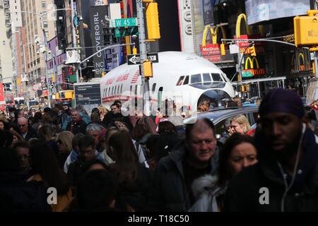 New York, USA. 24th March, 2019. A Lockheed Constellation plane know as 'Connie' has rolled  into Times Square, New York. The plane was built for Trans World Airlines, commissioned by the late recluse billionaire Howard Hughes in 1939. Hughes broke the trans -continental flight record from Burbank, California to New York in 1946 piloting the plane which was delivered to TWA in 1958. After a checked past the aircraft final destination is JFK Airport and is to be transformed into a cocktail lounge at the newly refurnished TWA Flight Center hotel. © 2019 Credit: G. Ronald Lopez/Alamy Live News Stock Photo