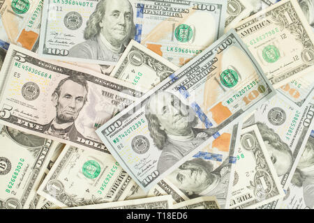 US dollar money cash background. Heap of American Dollars 100, 1 and 5 banknote gift profit concept Stock Photo
