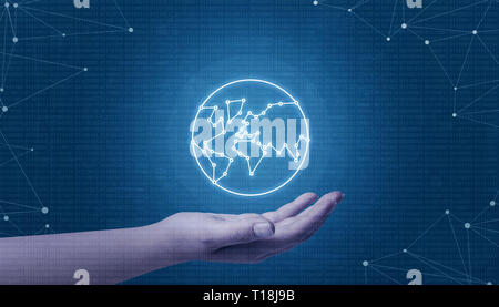 Hand holding globe network concept. Binary code in background and network threads. Stock Photo