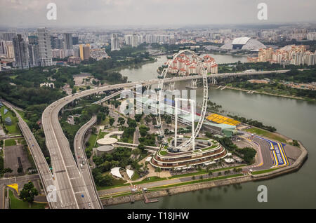 Singapore, Southeast Asia - December 15, 2018: Vibrant panorama of Downtown from observation deck of the Marina Bay Sands Sky Park. Marina Bay. Stock Photo