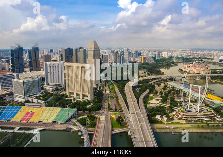 Singapore, Southeast Asia - December 15, 2018: Vibrant panorama of Downtown from observation deck of the Marina Bay Sands Sky Park. Marina Bay. Stock Photo