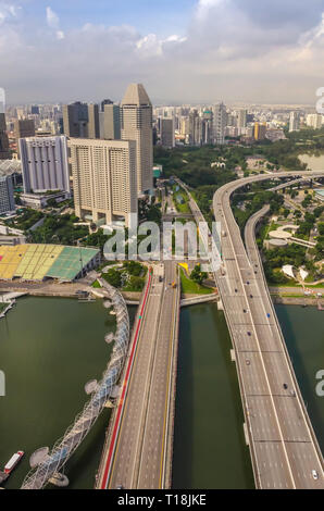 Singapore, Southeast Asia - December 15, 2018: Vibrant panorama of Downtown from observation deck of the Marina Bay Sands Sky Park. Marina Bay. Stock Photo