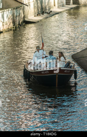 Prague, Czech Republic - September 10, 2019: couple on a romantic cruise trought Certovka canal Stock Photo