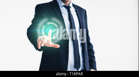 businessman pointing with finger on virtual screen - technology in business concept Stock Photo