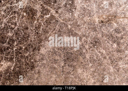Gold and white patterned real natural marble stone texture background for product design. Stock Photo