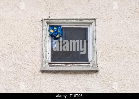 Old window with closed wooden shutters, Germany Stock Photo