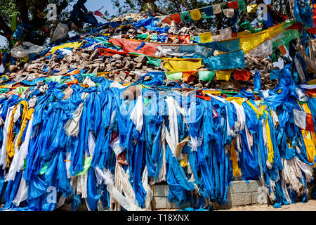 Prayer scarves and flags at the mausoleum of Genghis Khan, outside the city of Dongsheng in Inner Mongolia, China. Stock Photo