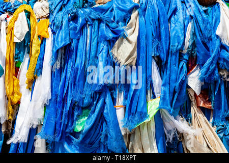 Prayer scarves and flags at the mausoleum of Genghis Khan, outside the city of Dongsheng in Inner Mongolia, China. Stock Photo