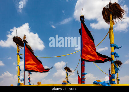 Flags and symbols at the mausoleum of Genghis Khan, outside the city of Dongsheng in Inner Mongolia, China. Stock Photo