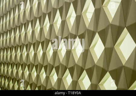 Geometric wall pattern with green background lights Stock Photo