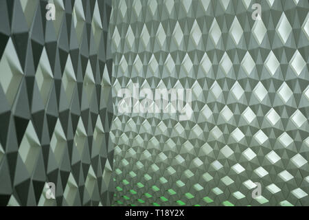 Geometric wall pattern with green background lights Stock Photo