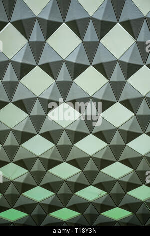 Geometric wall pattern with green background lights Stock Photo