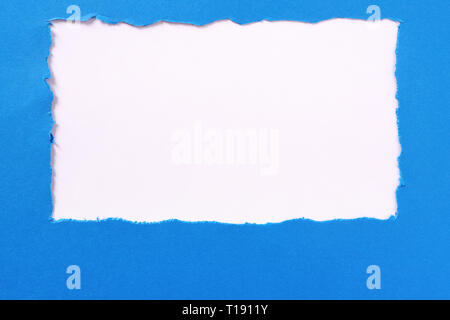 Torn blue paper white background border frame Stock Photo