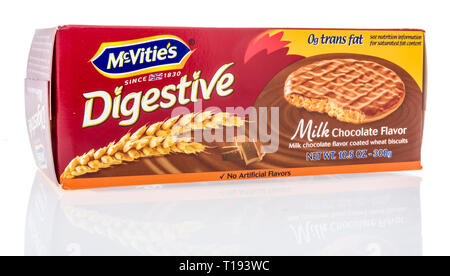 Winneconne, WI - 15 March 2019: A package of  Mcvities digestive milk chocolate flavor biscuits on an isolated background Stock Photo