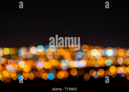 Abstract cityscape photograph of city night lights with a long exposure. Made for Wallpapers and Backgrounds. Photographed in Quito, Ecuador. Stock Photo