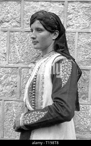 fashion, costume, young woman in national costume, Yugoslavia, mid 20th century, people, female, half-length, half length, folklore, clothes, Europe, Balkan Peninsula, the Balkans, 1930s, 1940s, 1950s, woman, women, national costume, national costumes, historic, historical, Additional-Rights-Clearance-Info-Not-Available Stock Photo
