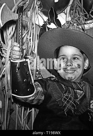 festivities, carnival, young boy disguised as cowboy, Germany, 1950s, Additional-Rights-Clearance-Info-Not-Available Stock Photo
