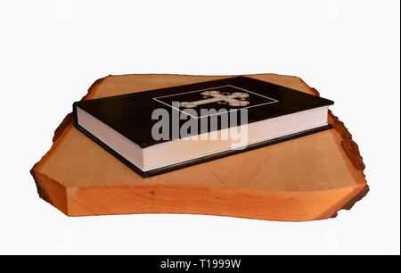 Book of prayers on a wooden board Stock Photo