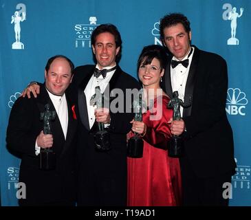 LOS ANGELES, CA. February 23, 1997: Seinfeld stars JASON ALEXANDER (left), JERRY SEINFELD, JULIA LOUIS DREYFUS & MICHAEL RICHARDS with their Screen Actors Guild Awards  for Comedy TV Series Ensemble.      Pix: PAUL SMITH Stock Photo