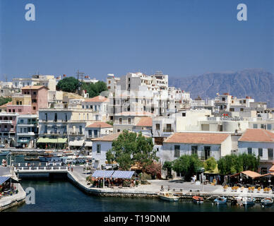 Greece. Crete. Agios Nikolaos. View of town and harbour. Stock Photo