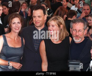 LOS ANGELES, CA - July 21, 1998:  Director STEVEN SPIELBERG (right) & wife KATE CAPSHAW with actor TOM HANKS & actress wife RITA WILSON at the world premiere of their new movie, 'Saving Private Ryan,' in Los Angeles. Stock Photo