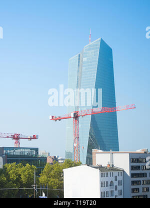 Construction cranes and European Central Bank building. Frankfurt, Germany Stock Photo