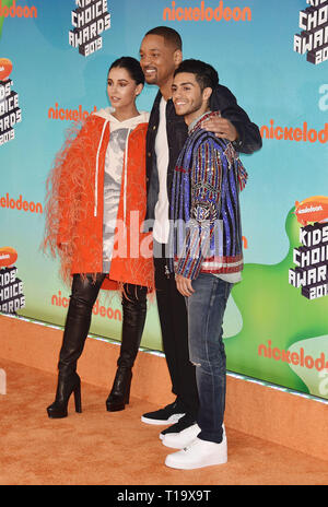 LOS ANGELES, CA - MARCH 23: (L-R) Naomi Scott, Will Smith and Mena Massoud attend Nickelodeon's 2019 Kids' Choice Awards at Galen Center on March 23, 2019 in Los Angeles, California. Stock Photo