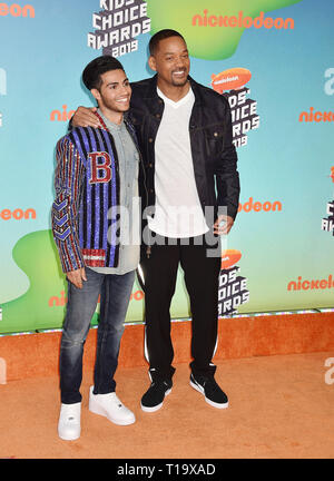 LOS ANGELES, CA - MARCH 23: Mena Massoud (L) and Will Smith attend Nickelodeon's 2019 Kids' Choice Awards at Galen Center on March 23, 2019 in Los Angeles, California. Stock Photo