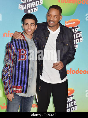 LOS ANGELES, CA - MARCH 23: Mena Massoud (L) and Will Smith attend Nickelodeon's 2019 Kids' Choice Awards at Galen Center on March 23, 2019 in Los Angeles, California. Stock Photo