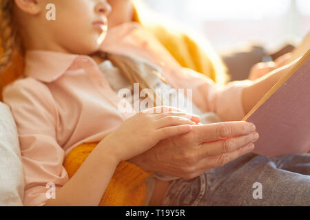 Reading Fairytale in Sunlight Stock Photo