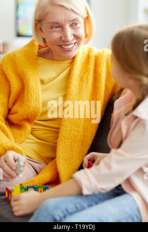 Mature Woman Playing with Child Stock Photo