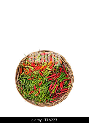 Bird Eye Chili in Wicker Basket Isolated on White Background, Clipping Path Stock Photo