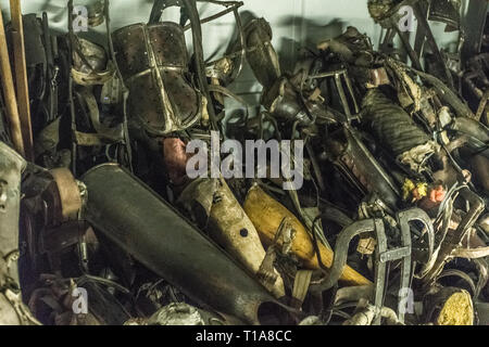 Oswiencim, Poland - September 21, 2019: Pile of prostheses in former German Nazi Concentration and Extermination Camp Auschwitz-Birkenau.