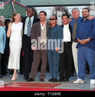 LOS ANGELES, CA - July 7, 1998: 'Lethal Weapon 4' stars RENE RUSSO (left), DANNY GLOVER, MEL GIBSON, JOE PESCI & JET LI with director RICHARD DONNER & producer JOEL SILVER at Mann's Chinese Theatre where Glover had his hand & footprints set in cement. Stock Photo