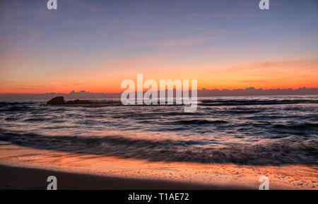 This great photo shows the sunrise of Hua Hin in Thailand early morning at sunrise. You can see very well the coast of the gulf of Thailand Stock Photo