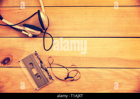 Vintage cassette tapes with radio-cassette player on a wooden table Stock  Photo - Alamy