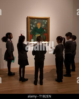 London, UK. 25th Mar, 2019. School children study the painting by artist Vincent van Gogh during the preview for the Van Gogh and Britain exhibition at Tate Britain in London, Britain on March 25, 2019. The exhibition will be open from March 27 to August 11. Credit: Han Yan/Xinhua/Alamy Live News