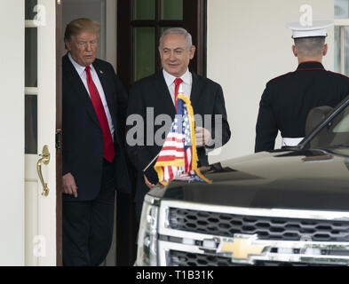 Washington, District of Columbia, USA. 25th Mar, 2019. United States President Donald J. Trump escorts the Prime Minister of Israel, Benjamin Netanyahu after meeting at the White House in Washington, DC, March 25, 2019. Credit: Chris Kleponis/CNP Credit: Chris Kleponis/CNP/ZUMA Wire/Alamy Live News Stock Photo